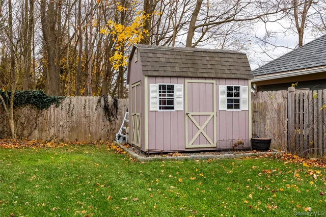 a view of a backyard of the house