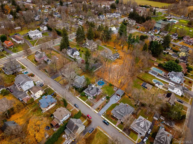 an aerial view of residential building and parking space