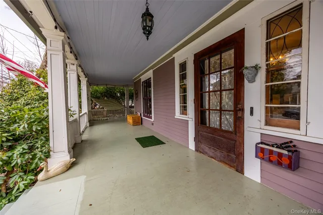 a view of front door and porch of the house