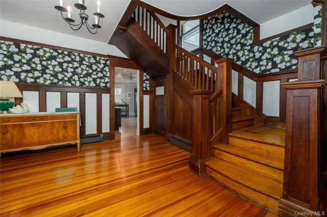 a view of entryway with wooden floor