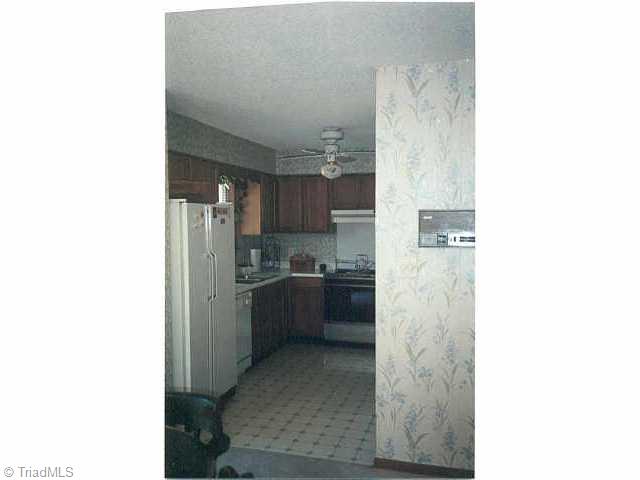 240 Northpoint Avenue, Unit D High Point, NC 27262 - Photo 8 of 9 Other. Compact kitchen workplace.