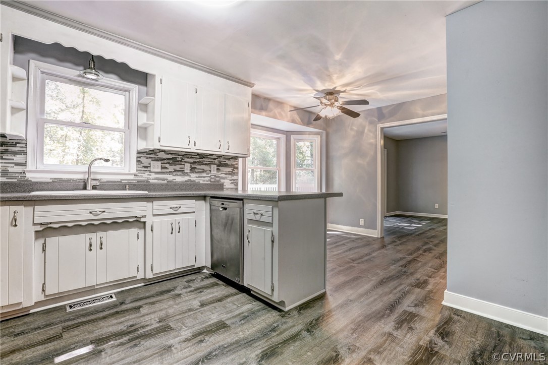 7519 Barkbridge Road Chesterfield, VA 23832 - Photo 15 of 40 a kitchen with a sink cabinets appliances and a window