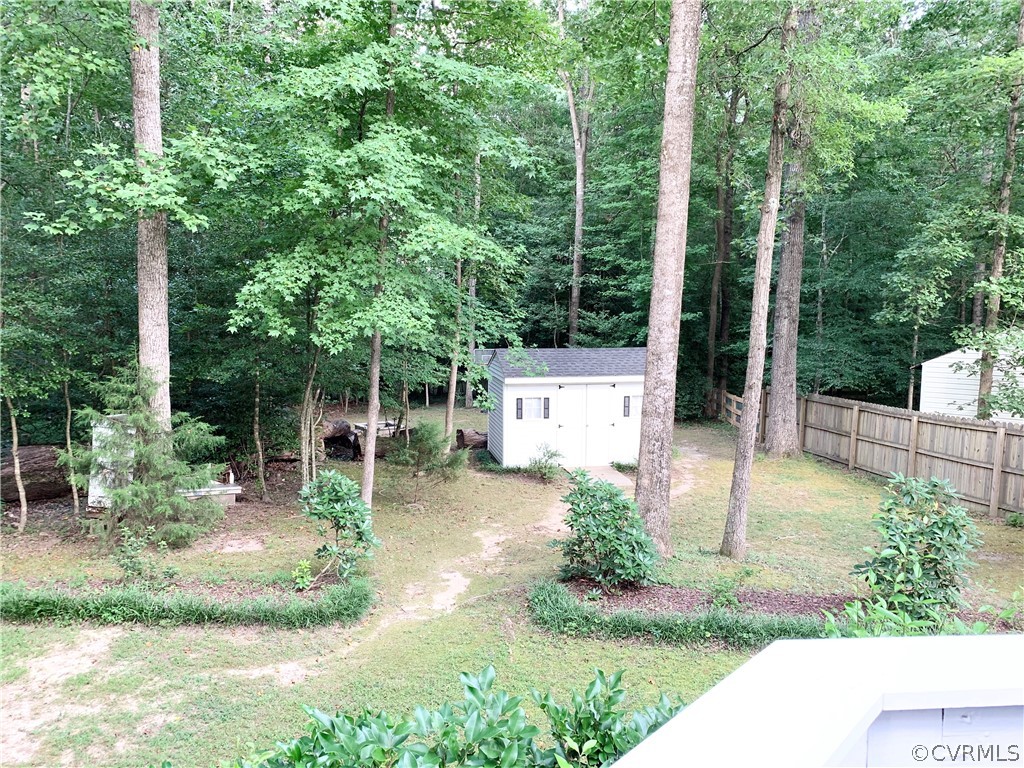 7519 Barkbridge Road Chesterfield, VA 23832 - Photo 31 of 40 a view of a chair and table in the garden