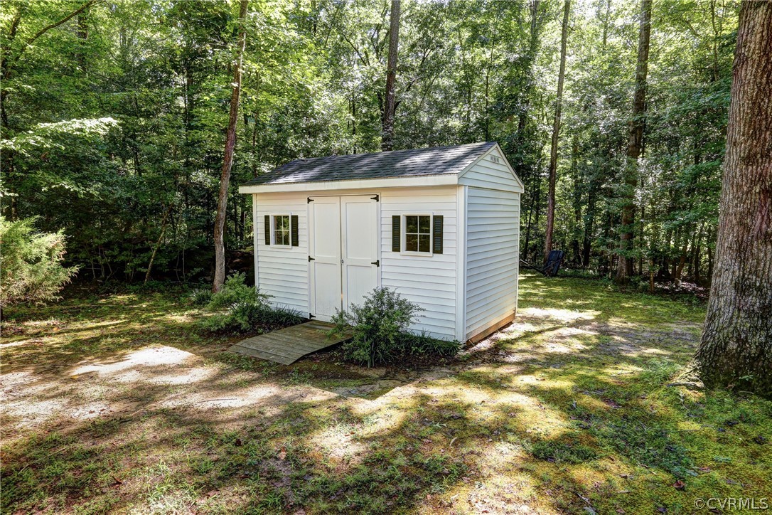 7519 Barkbridge Road Chesterfield, VA 23832 - Photo 37 of 40 a view of backyard of house with green space
