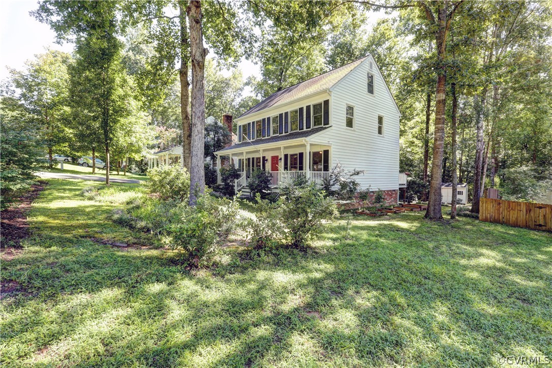7519 Barkbridge Road Chesterfield, VA 23832 - Photo 4 of 40 a front view of house with yard and trees around