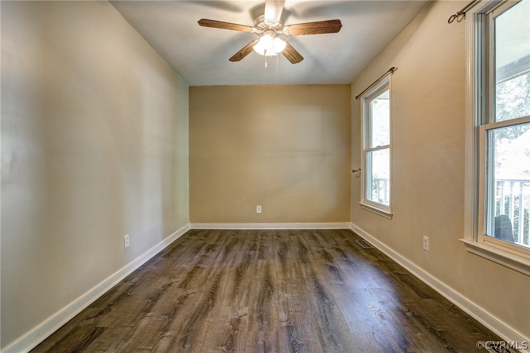 7519 Barkbridge Road Chesterfield, VA 23832 - Photo 5 of 40 wooden floor in an empty room with a window