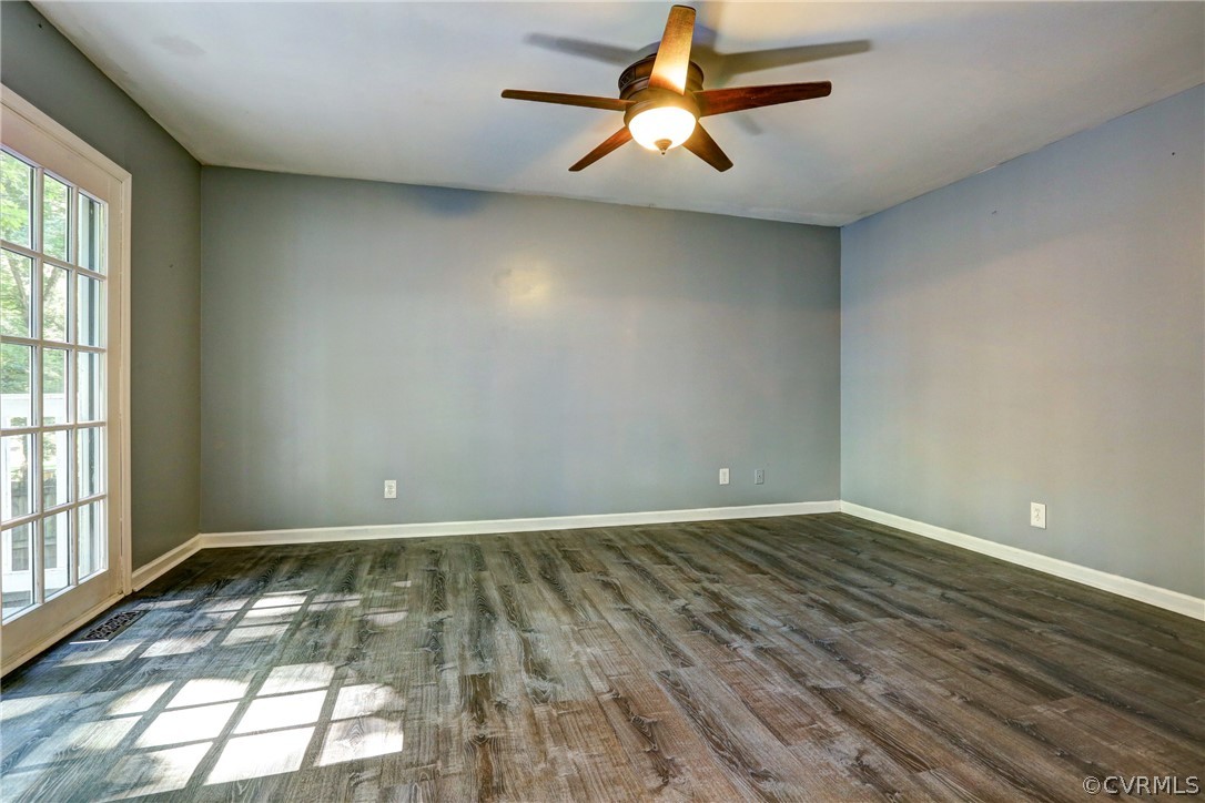 7519 Barkbridge Road Chesterfield, VA 23832 - Photo 6 of 40 wooden floor in an empty room with a window