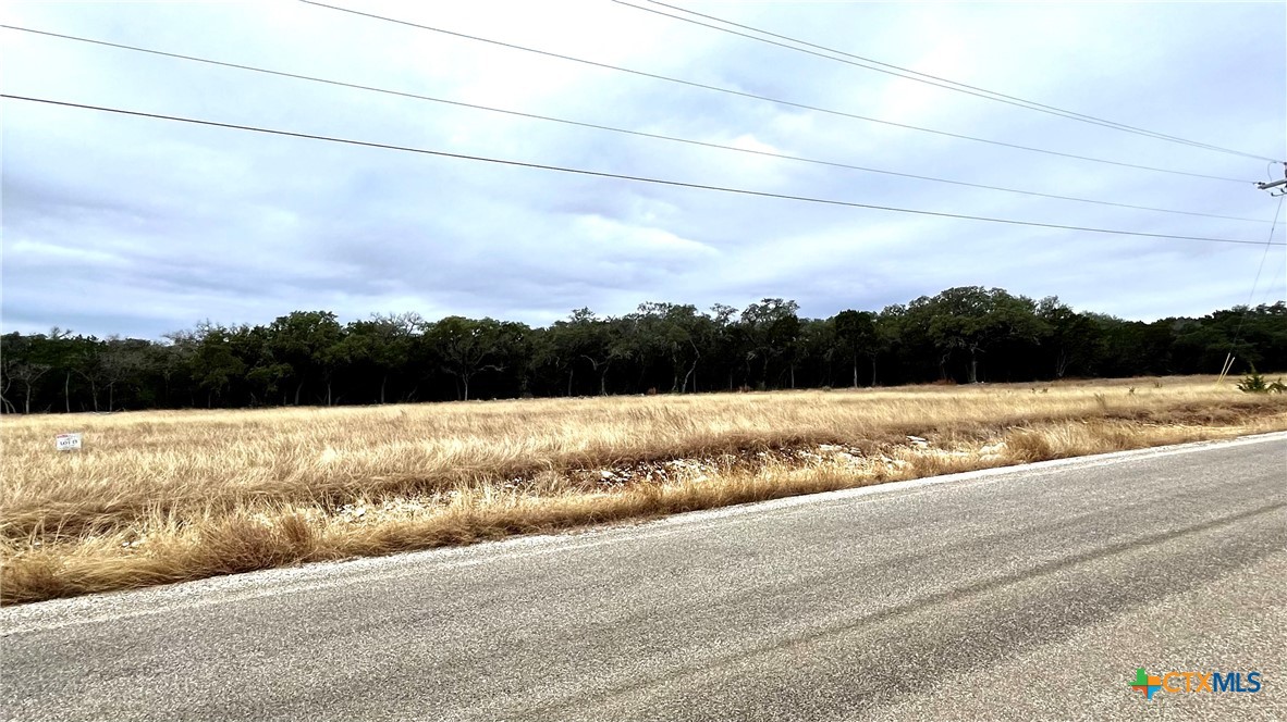 Lot 15 Clearwater Canyon Road Bandera, TX 78003 - Photo 8 of 9 a view of a terrace with a lake
