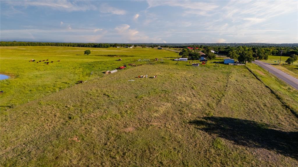 18100 Farm To Market 920 Poolville, TX 76487 - Photo 20 of 32 a view of an ocean and beach