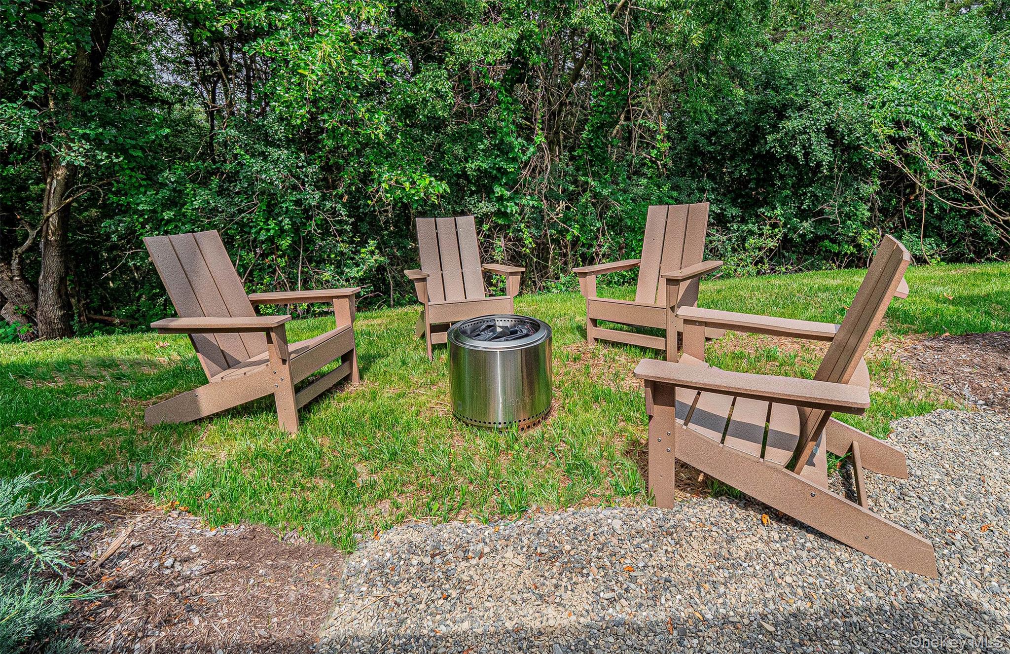 197 Wheeler Road, Unit 101 Florida, NY 10921 - Photo 20 of 41 Patio area with space for smokeless fire pit and lawn chairs