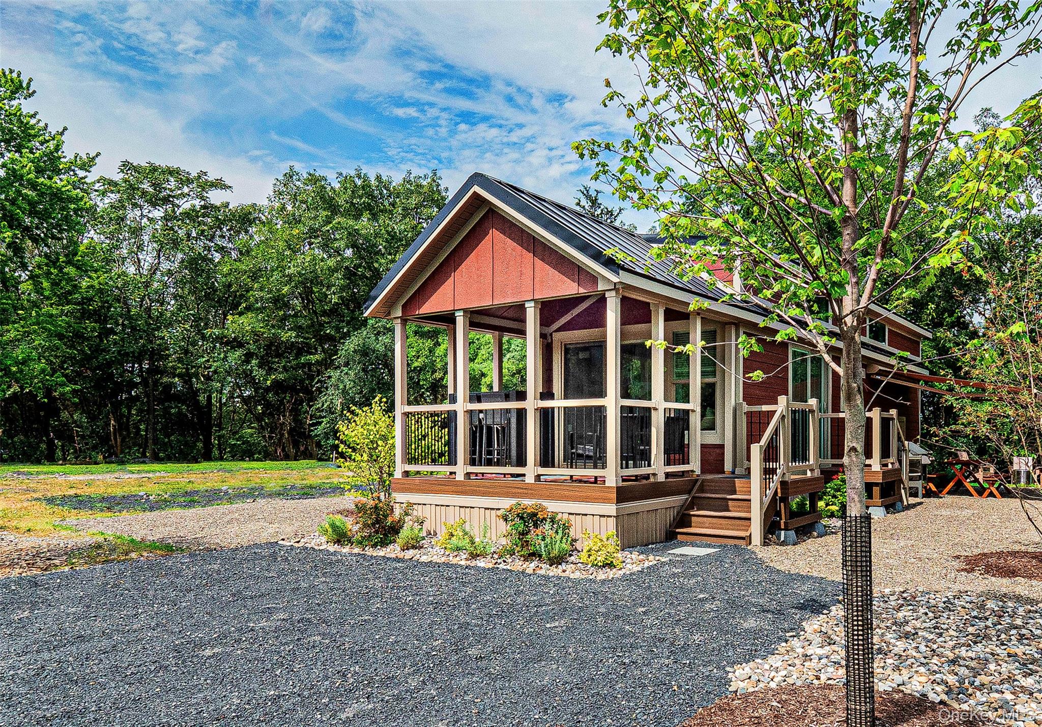 197 Wheeler Road, Unit 101 Florida, NY 10921 - Photo 3 of 41 Side view of the Warwick with a porch