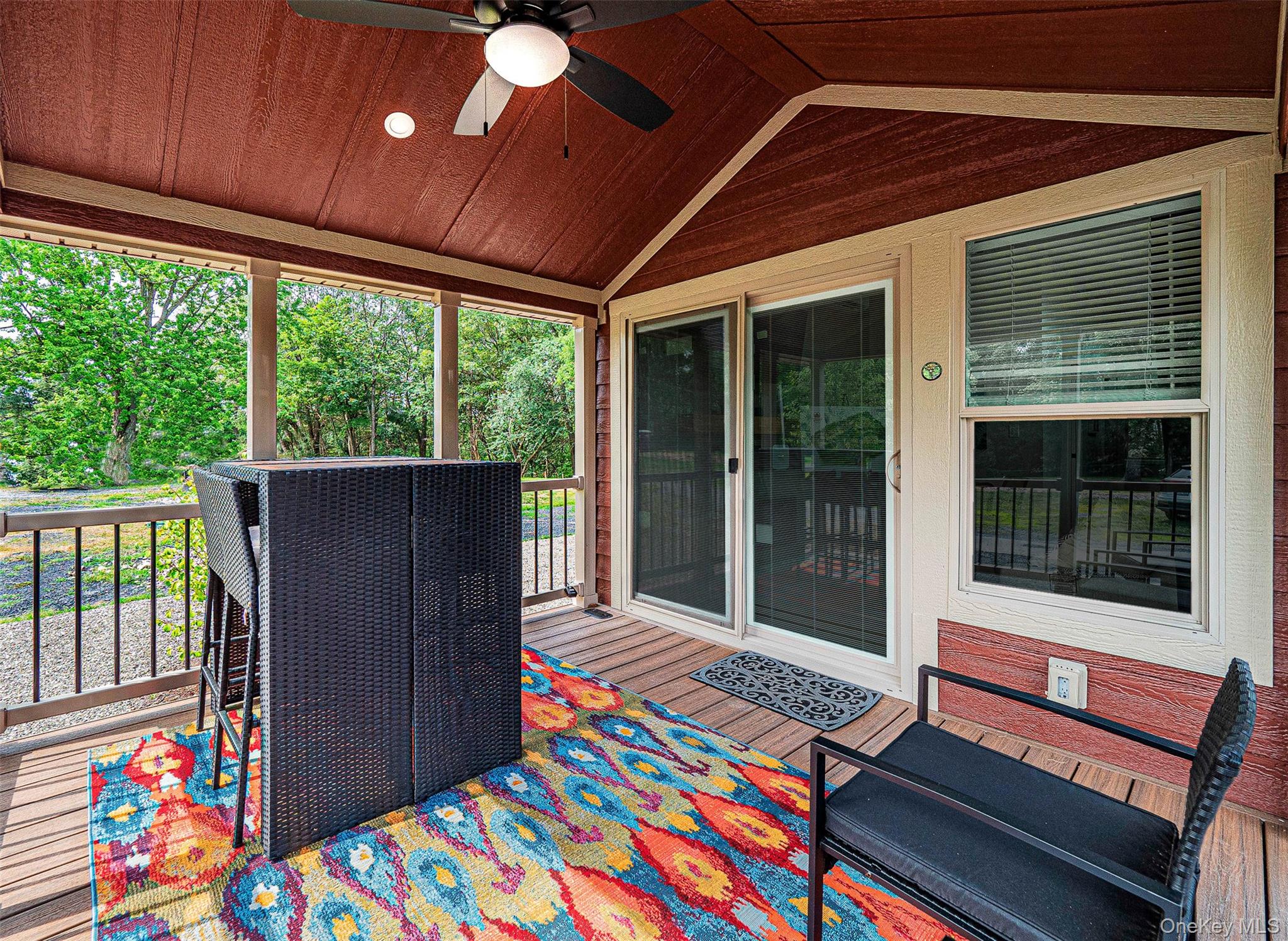 197 Wheeler Road, Unit 101 Florida, NY 10921 - Photo 4 of 41 Sunroom / front porch featuring a wooden deck, a ceiling fan, and plenty of natural light