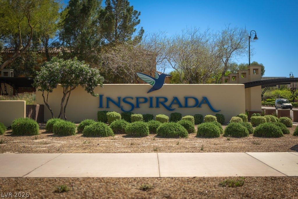 3069 Scenic Rhyme Avenue Henderson, NV 89044 - Photo 22 of 29 Welcome to Inspirada — one of Henderson's most established master-planned communities, with resort-style amenities included in your HOA. The hummingbird-marked entrance sets the tone for everything behind it.