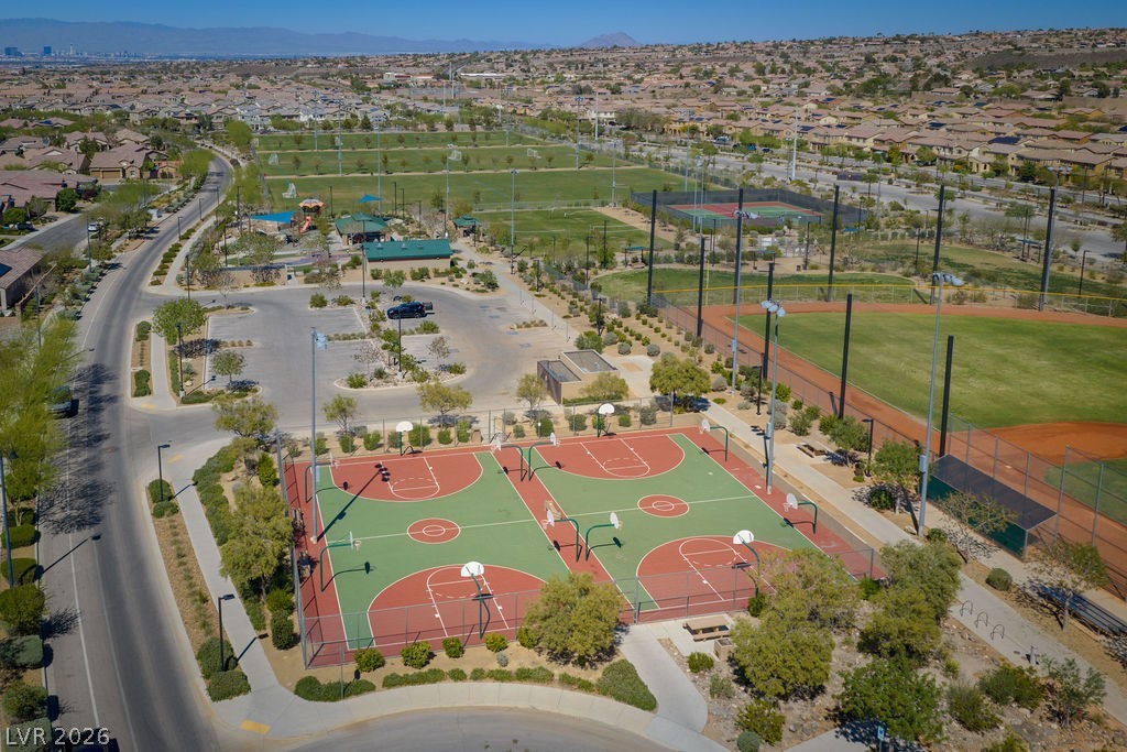 3069 Scenic Rhyme Avenue Henderson, NV 89044 - Photo 24 of 29 The community park features a full children's play structure, a splash pad area, shaded pavilions, and landscaped walking paths — all HOA-maintained. For families with kids, this is a daily amenity, not an occasional outing.