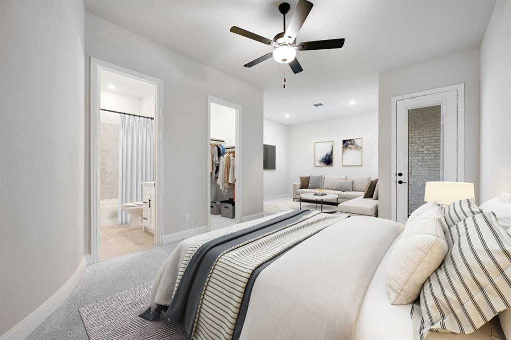 1612 Yellow Rose Road Celina, TX 75009 - Photo 22 of 40 a bedroom with two large bed and a chandelier