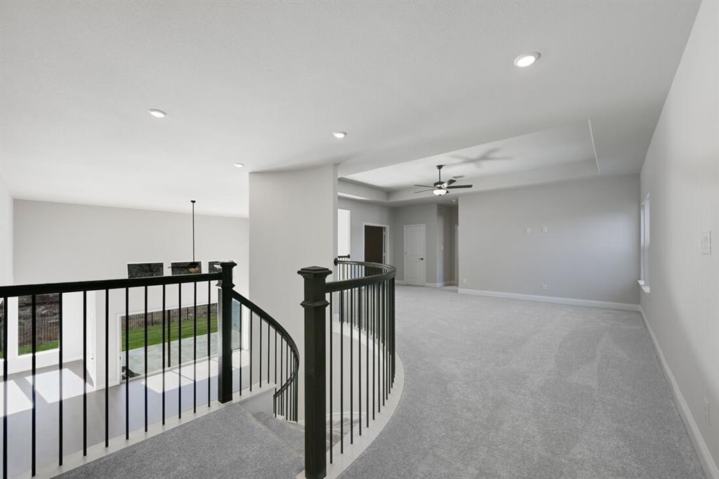1612 Yellow Rose Road Celina, TX 75009 - Photo 28 of 40 a view of hallway with balcony