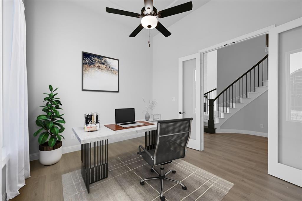1612 Yellow Rose Road Celina, TX 75009 - Photo 30 of 40 a view of a workspace with furniture and wooden floor
