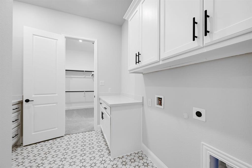 1612 Yellow Rose Road Celina, TX 75009 - Photo 31 of 40 a bathroom with a sink