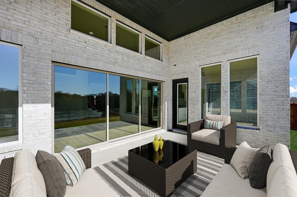 1612 Yellow Rose Road Celina, TX 75009 - Photo 33 of 40 a building outdoor space with patio furniture