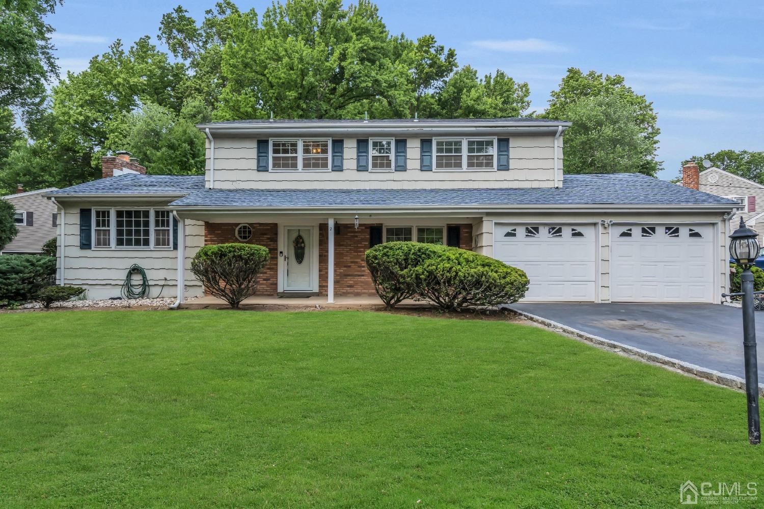 2 Greenwich Road Edison, NJ 08820 - Photo 1 of 31 front view of a house with a yard