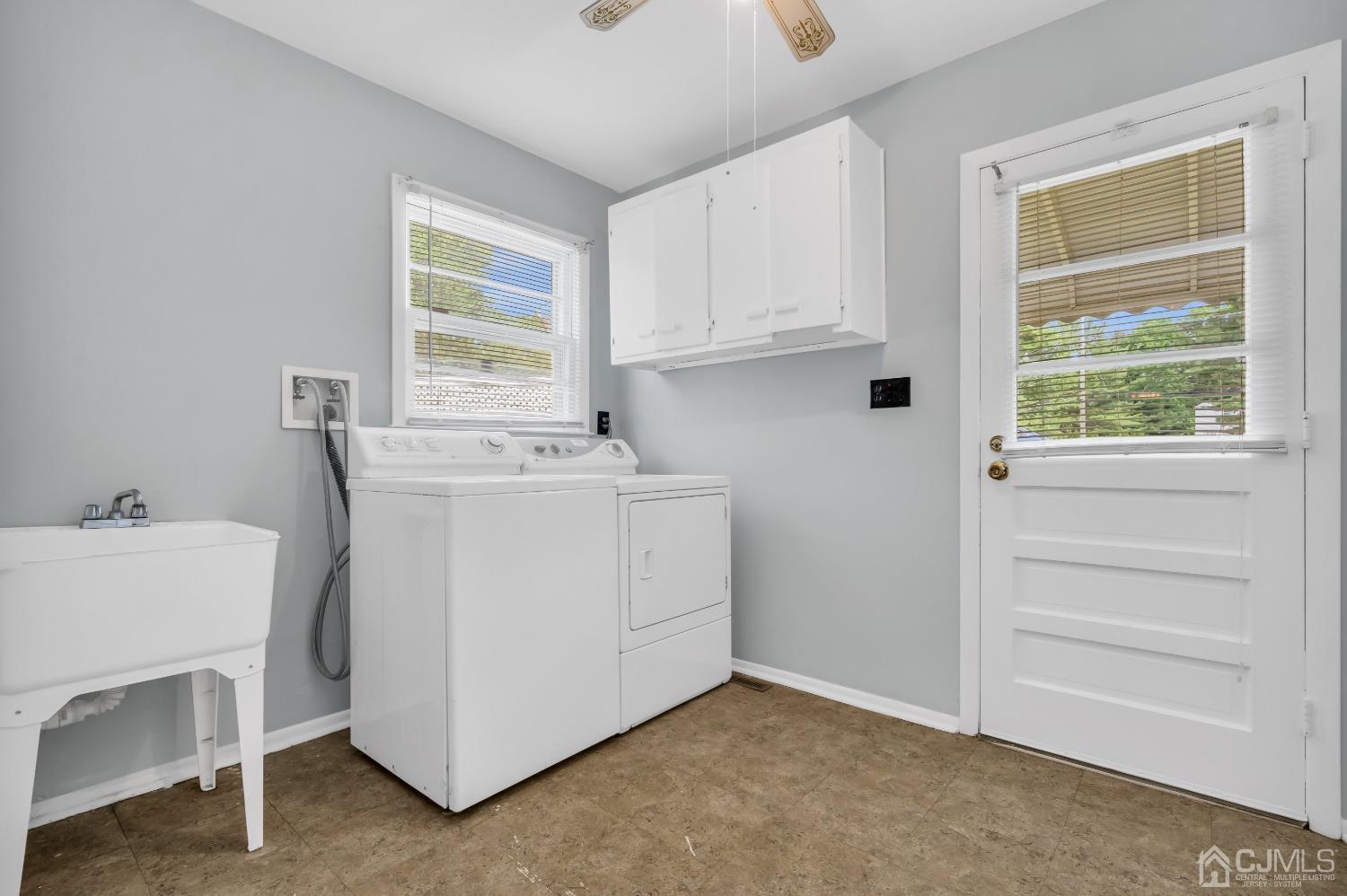 2 Greenwich Road Edison, NJ 08820 - Photo 15 of 31 a utility room with cabinets washer and dryer