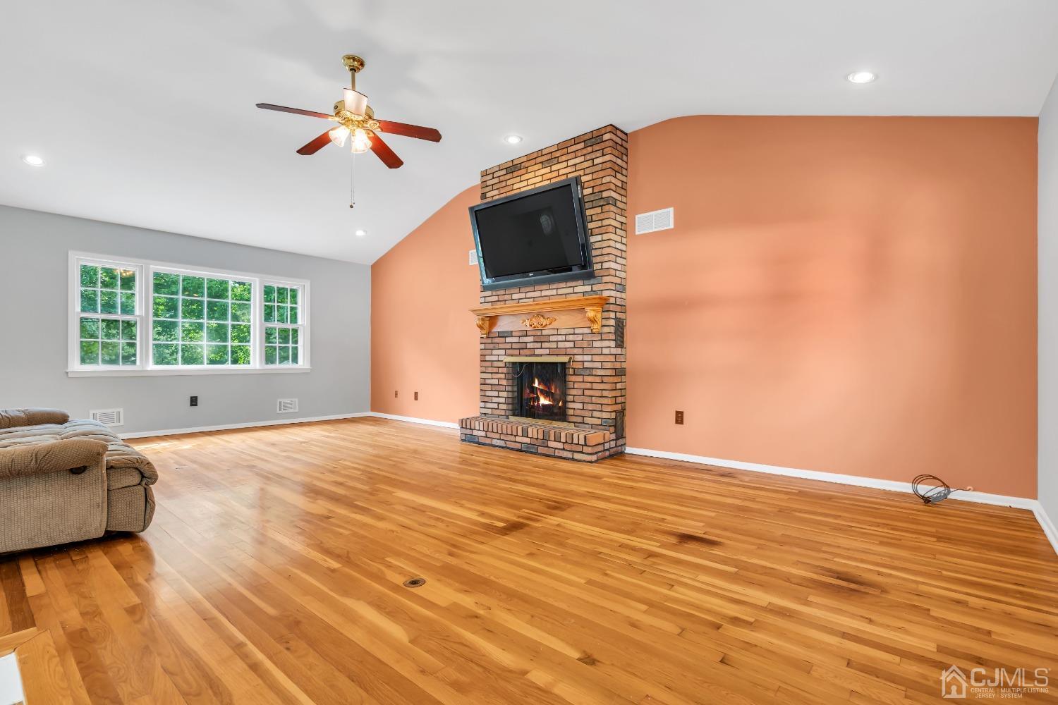 2 Greenwich Road Edison, NJ 08820 - Photo 18 of 31 a view of an empty room with a fireplace and a window