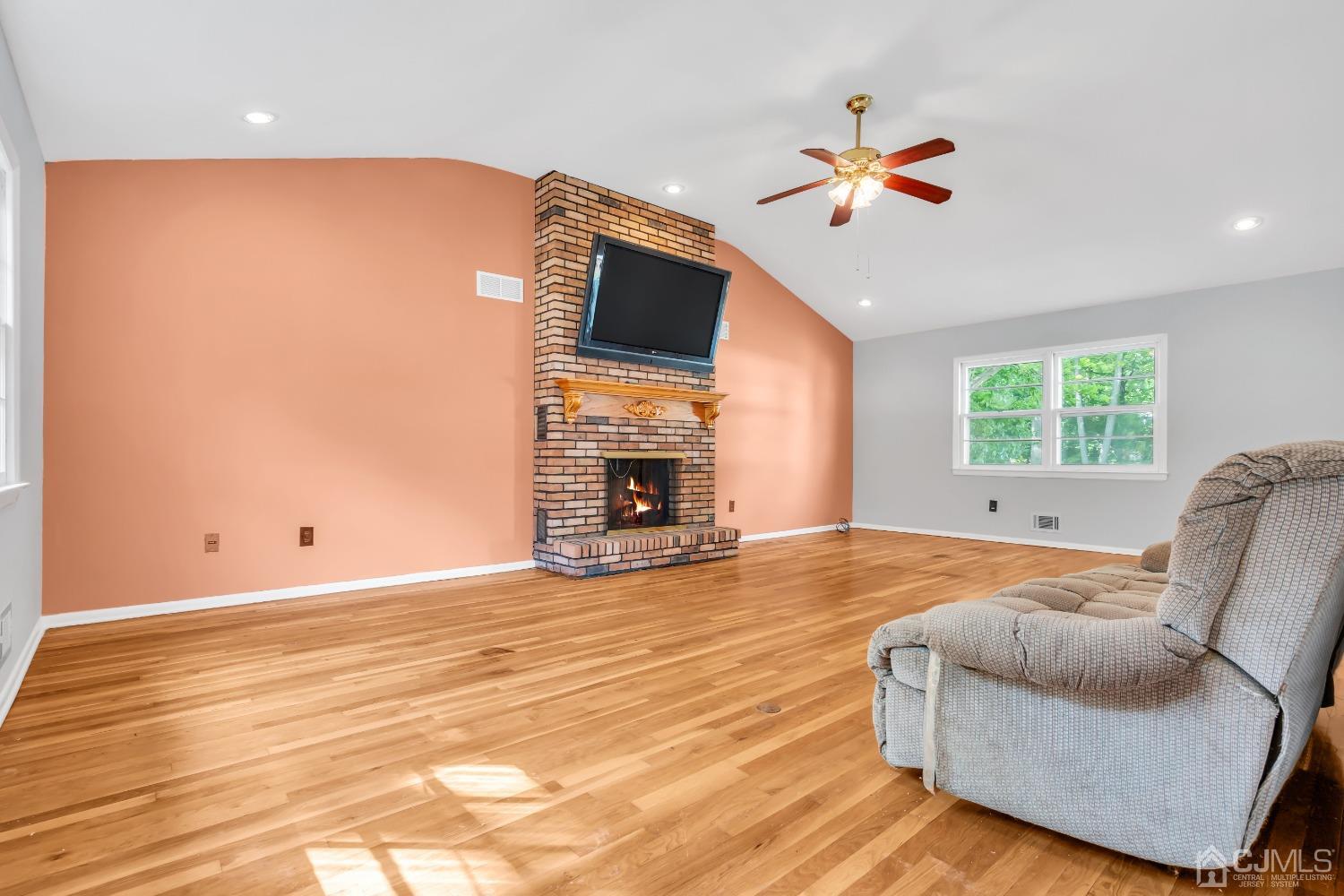 2 Greenwich Road Edison, NJ 08820 - Photo 20 of 31 a living room with furniture and a fireplace