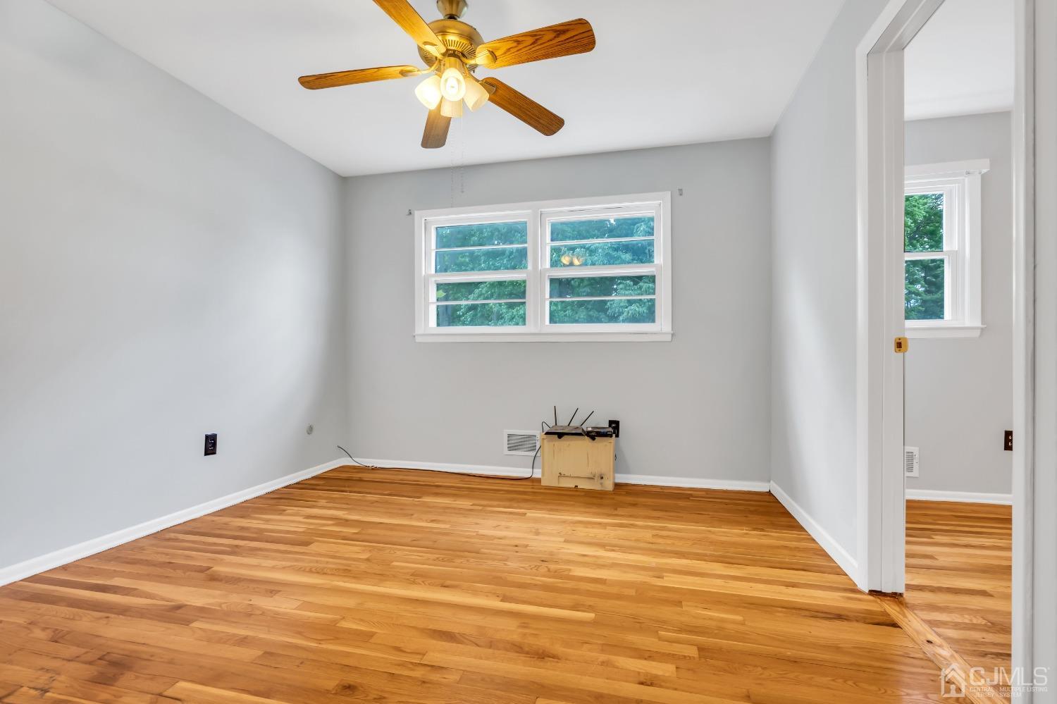 2 Greenwich Road Edison, NJ 08820 - Photo 22 of 31 a view of a room with a window and wooden floor