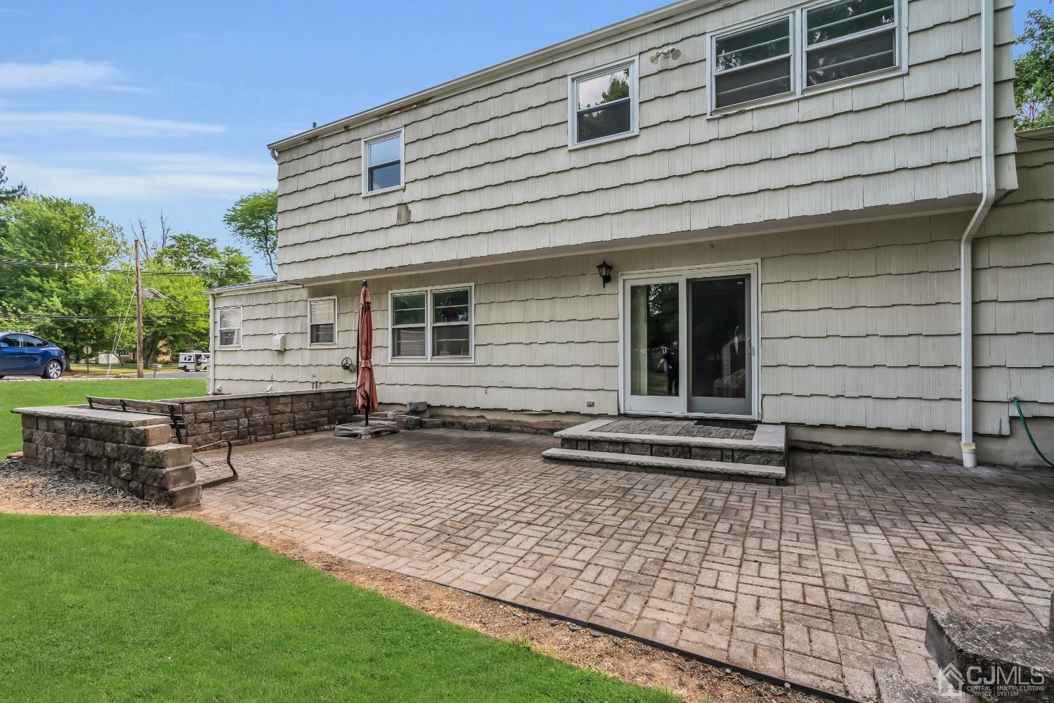 2 Greenwich Road Edison, NJ 08820 - Photo 30 of 31 a backyard of a house with outdoor seating
