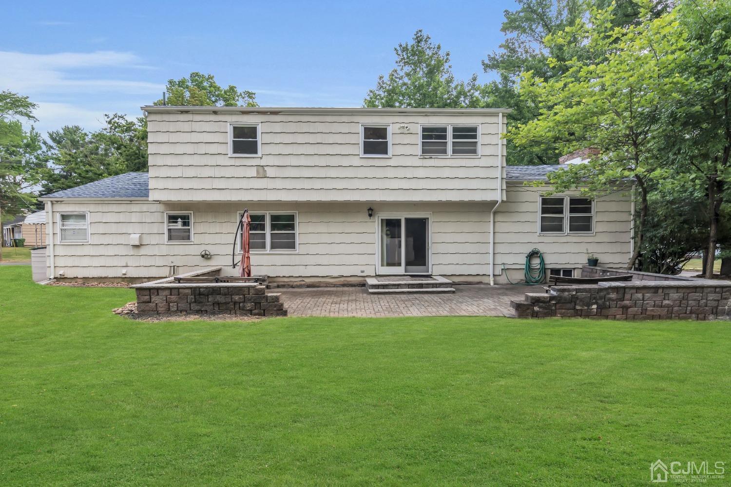 2 Greenwich Road Edison, NJ 08820 - Photo 31 of 31 a front view of house with yard patio and green space