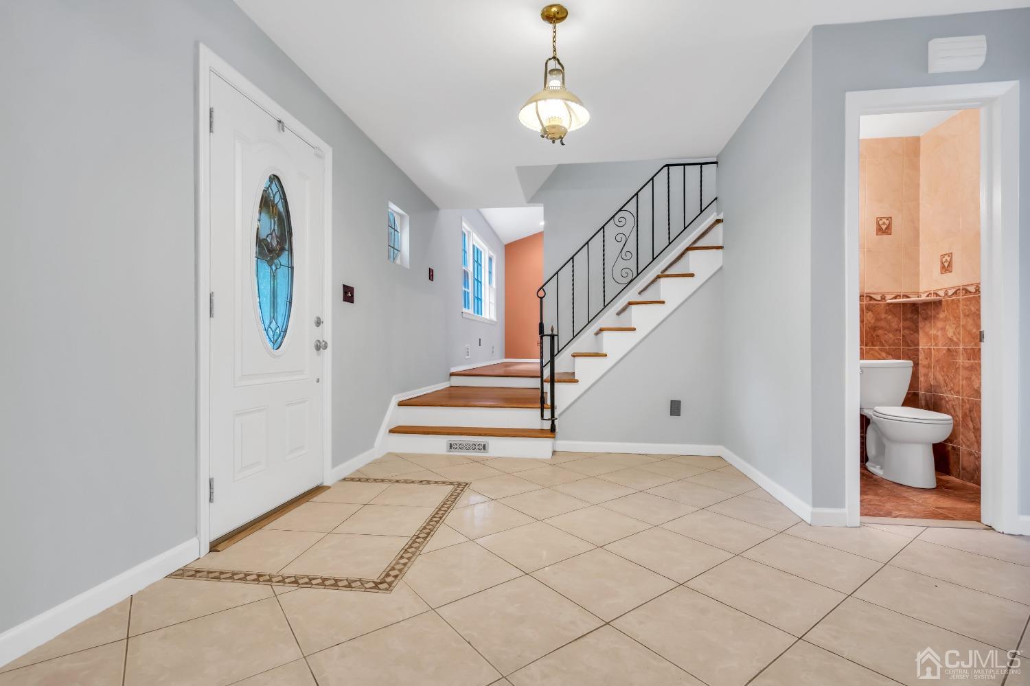 2 Greenwich Road Edison, NJ 08820 - Photo 4 of 31 a view of entryway with wooden floor