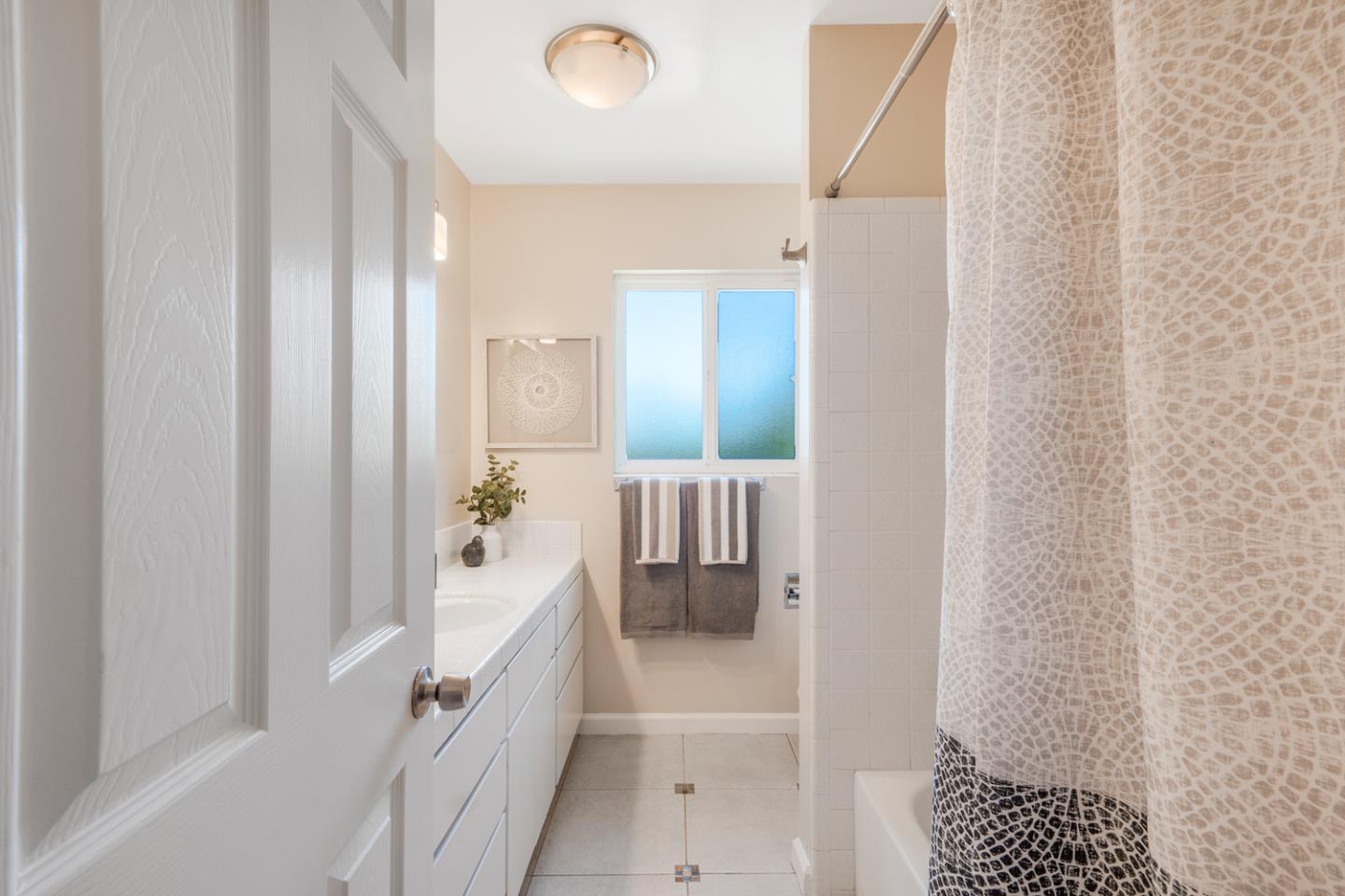 2486 Whitney Drive Mountain View, CA 94043 - Photo 13 of 43 a bathroom with a bathtub