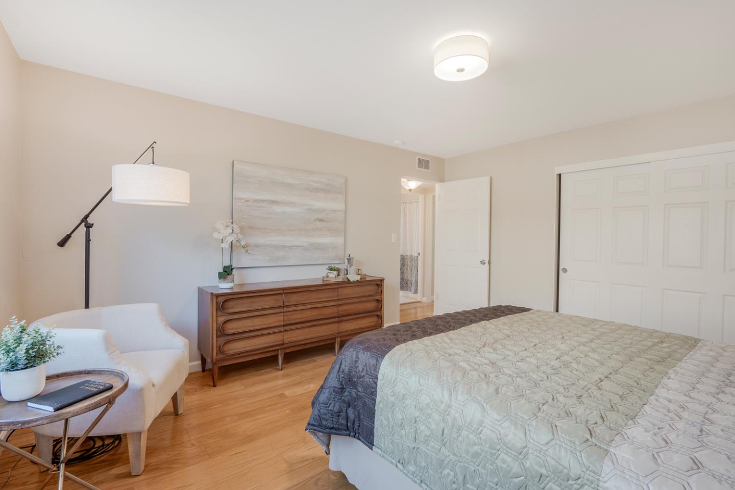 2486 Whitney Drive Mountain View, CA 94043 - Photo 16 of 43 a bedroom with a bed and chair