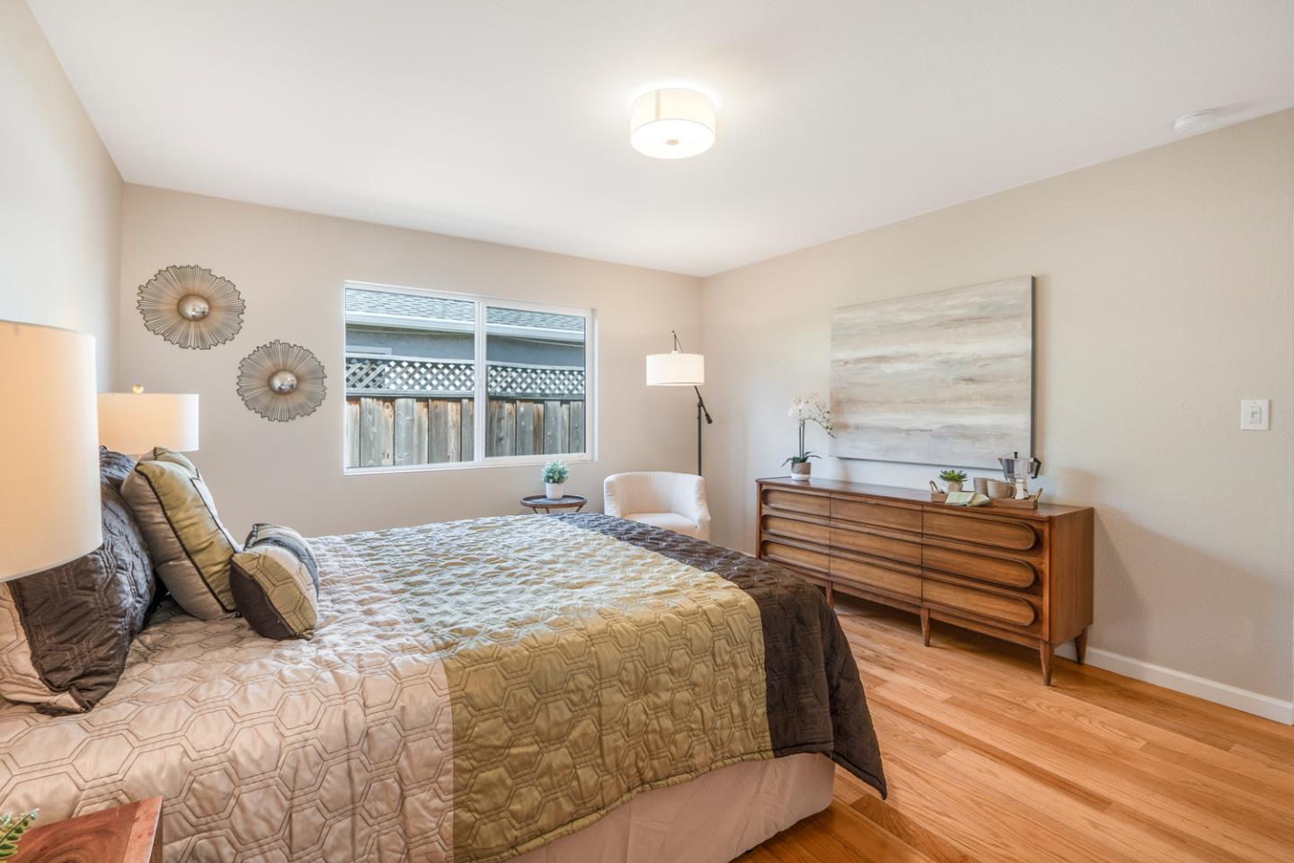 2486 Whitney Drive Mountain View, CA 94043 - Photo 17 of 43 a bedroom with a bed and a window