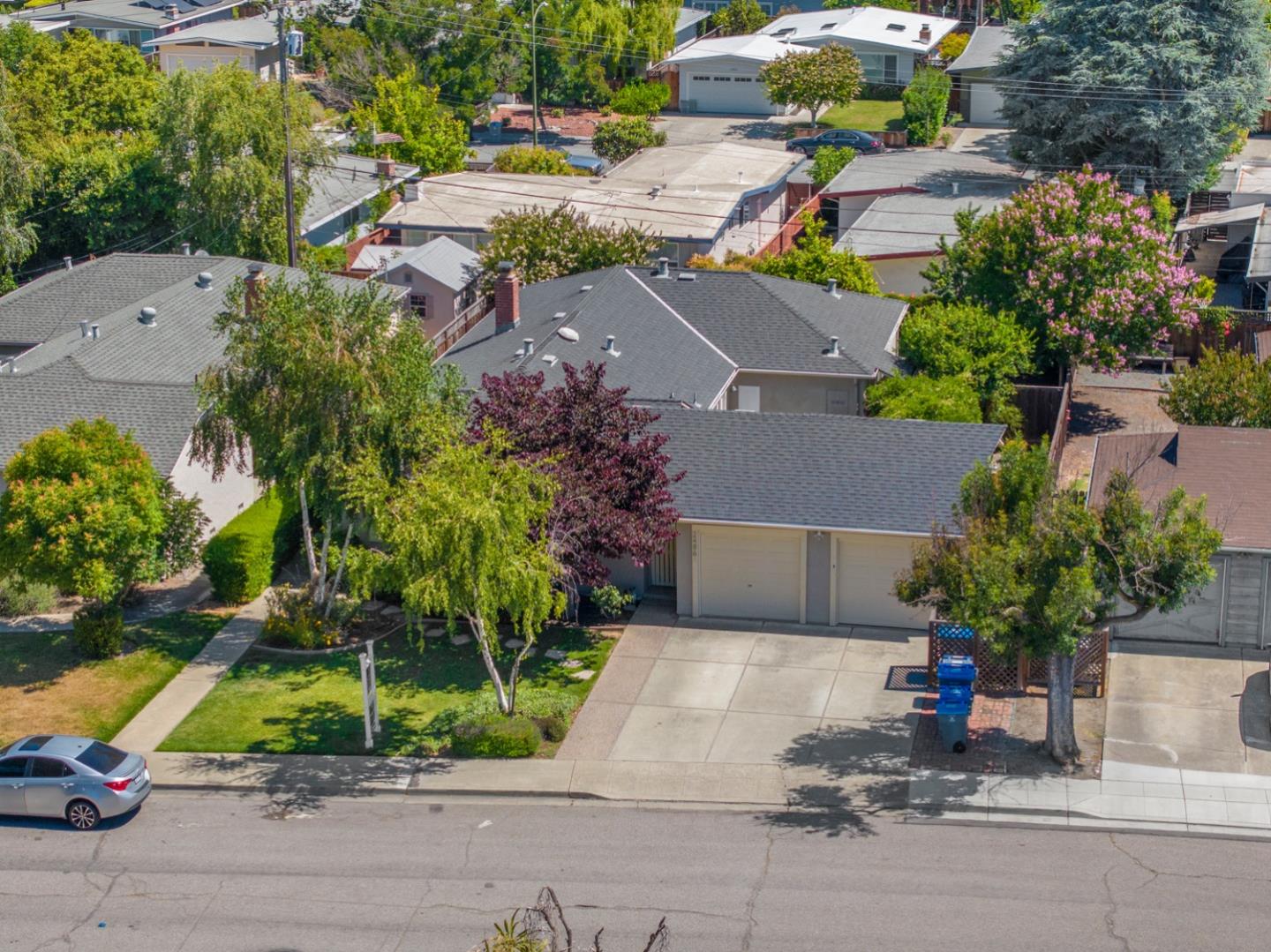 2486 Whitney Drive Mountain View, CA 94043 - Photo 2 of 43 an aerial view of a house with a yard and potted plants