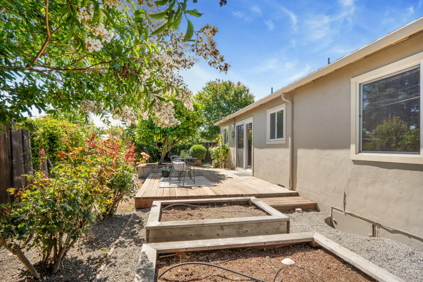 2486 Whitney Drive Mountain View, CA 94043 - Photo 21 of 43 a view of a house with a yard