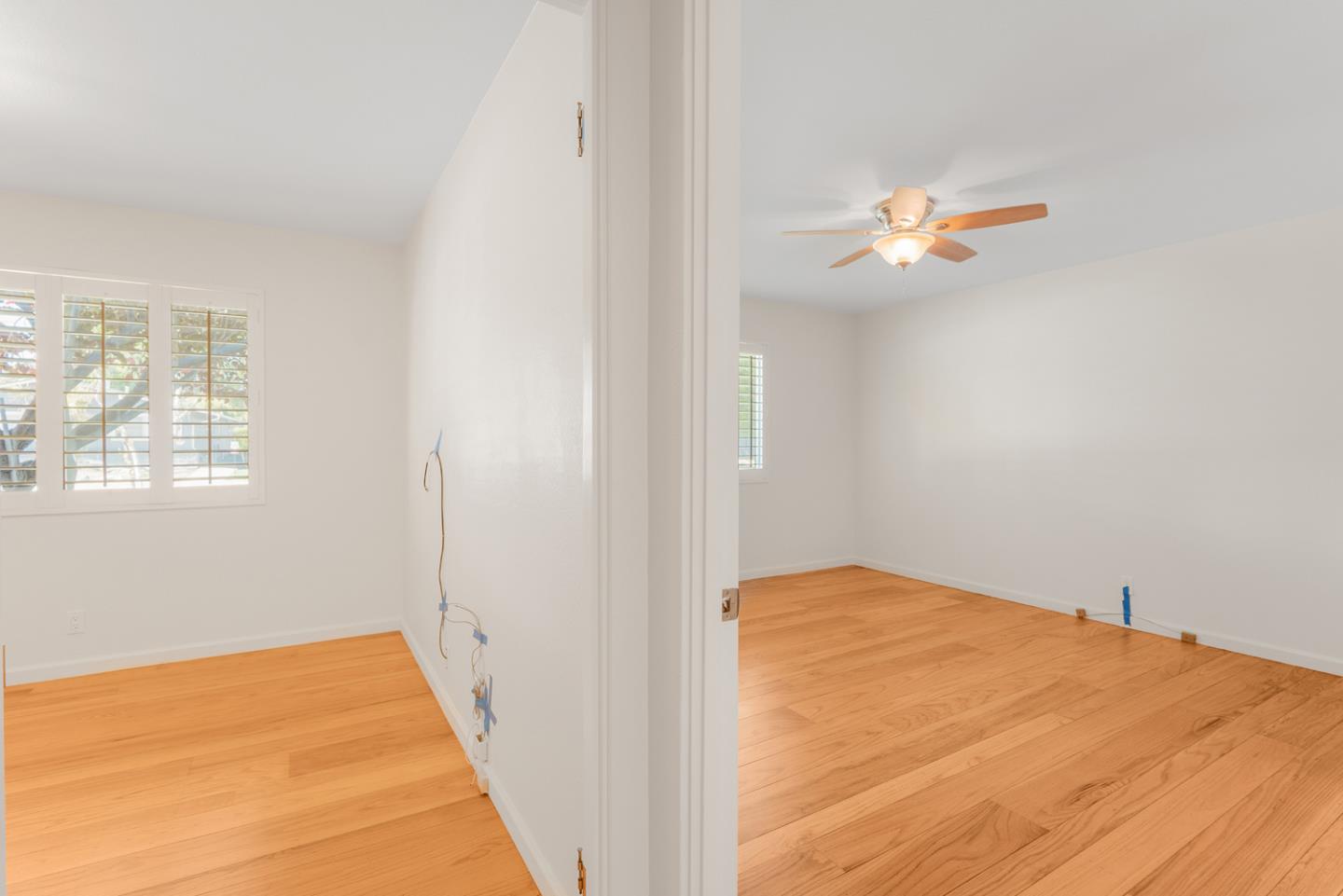 2486 Whitney Drive Mountain View, CA 94043 - Photo 36 of 43 a view of a bedroom with wooden floor and a window