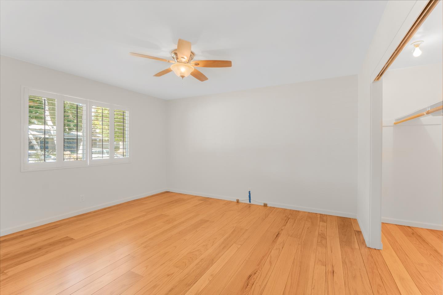 2486 Whitney Drive Mountain View, CA 94043 - Photo 37 of 43 a view of a room with a wooden floor and a window