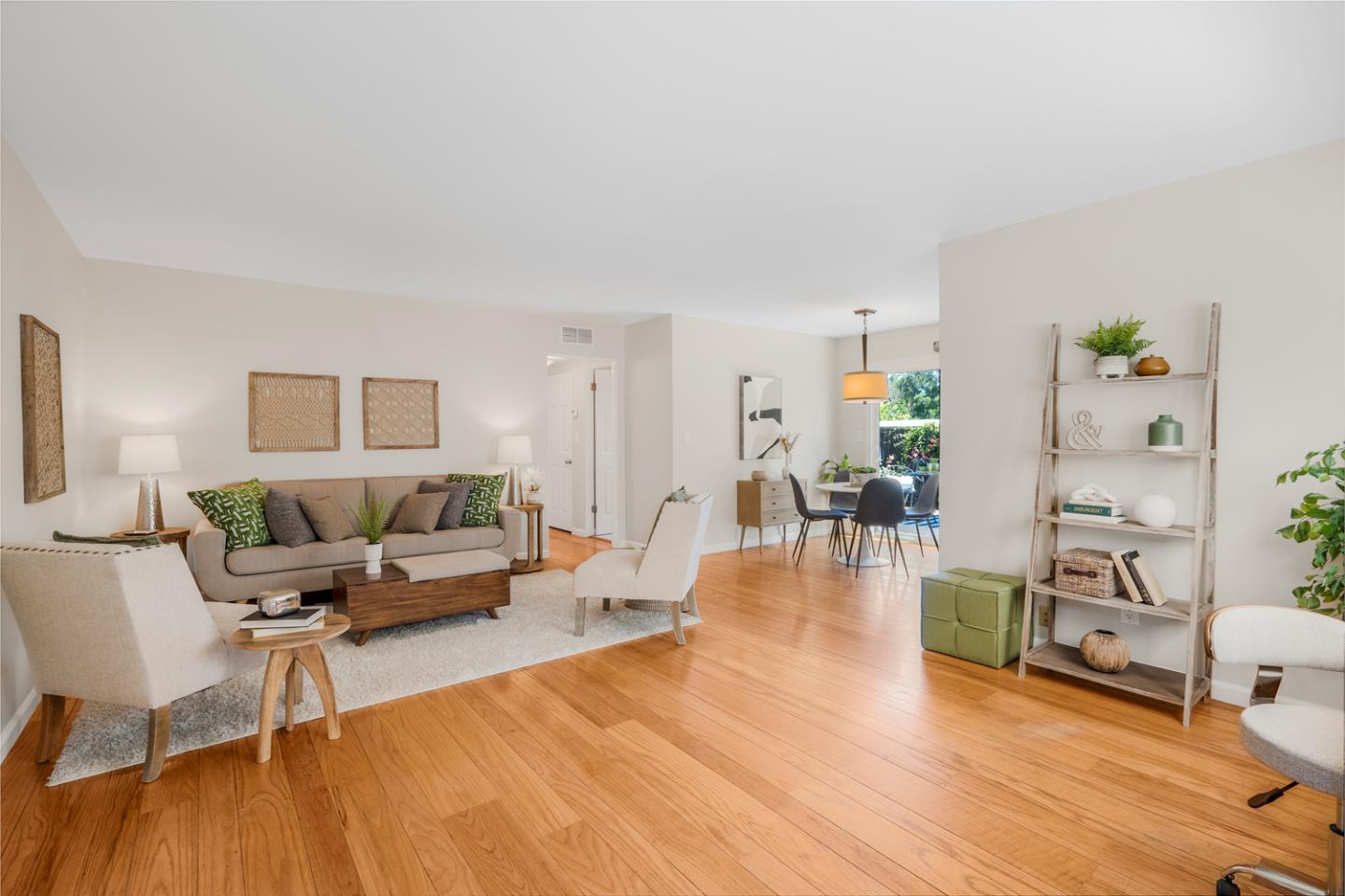 2486 Whitney Drive Mountain View, CA 94043 - Photo 4 of 43 a living room with furniture and a wooden floor
