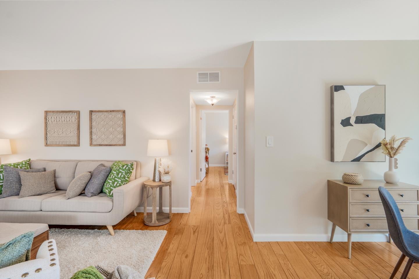 2486 Whitney Drive Mountain View, CA 94043 - Photo 10 of 43 a living room with furniture and a wooden floor