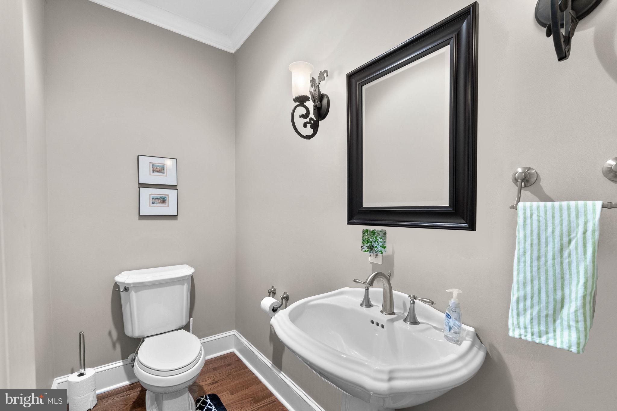 3418 Toone Street Baltimore, MD 21224 - Photo 12 of 51 Main level powder room