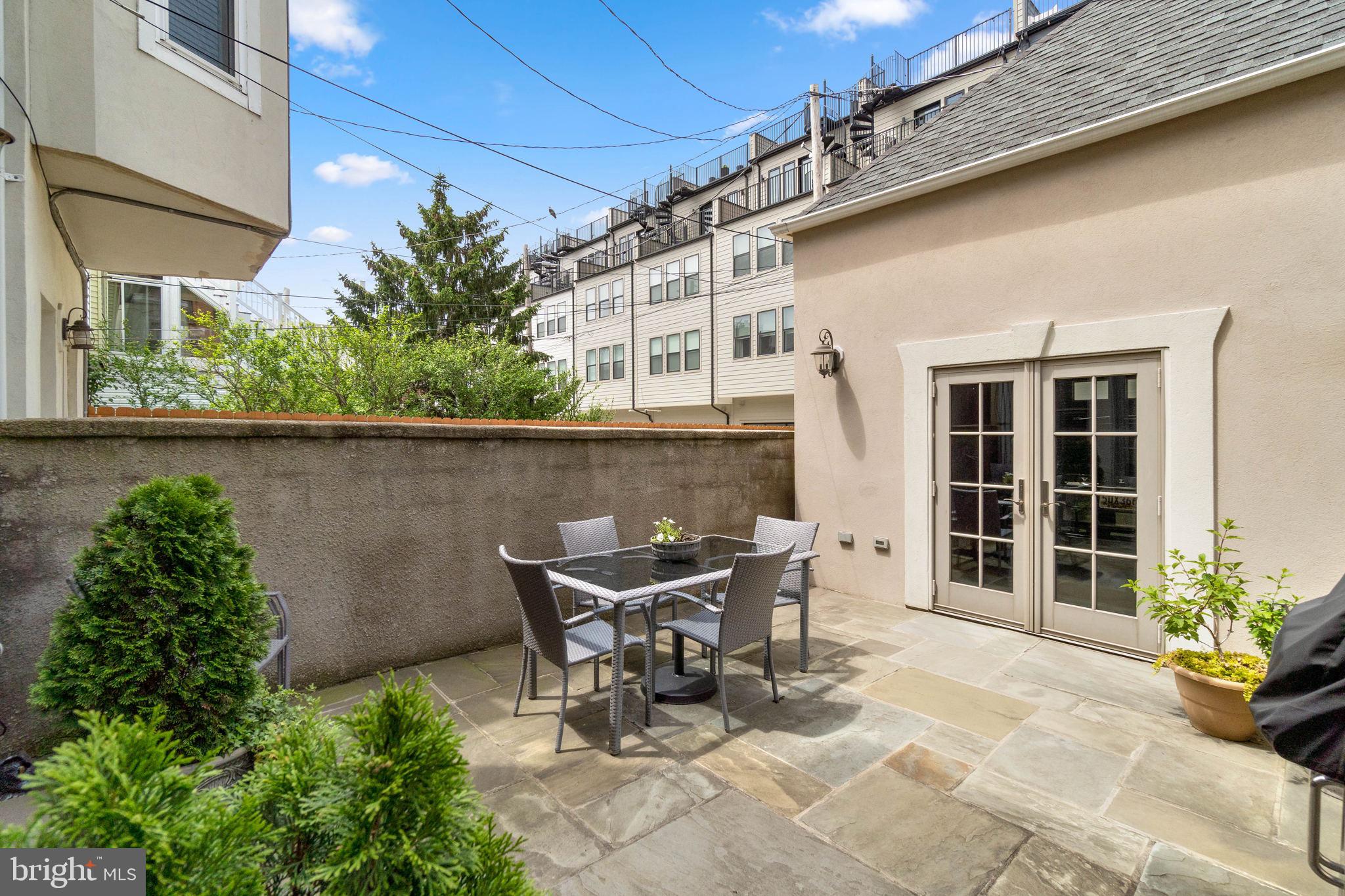 3418 Toone Street Baltimore, MD 21224 - Photo 14 of 51 Bluestone terrace off of main level