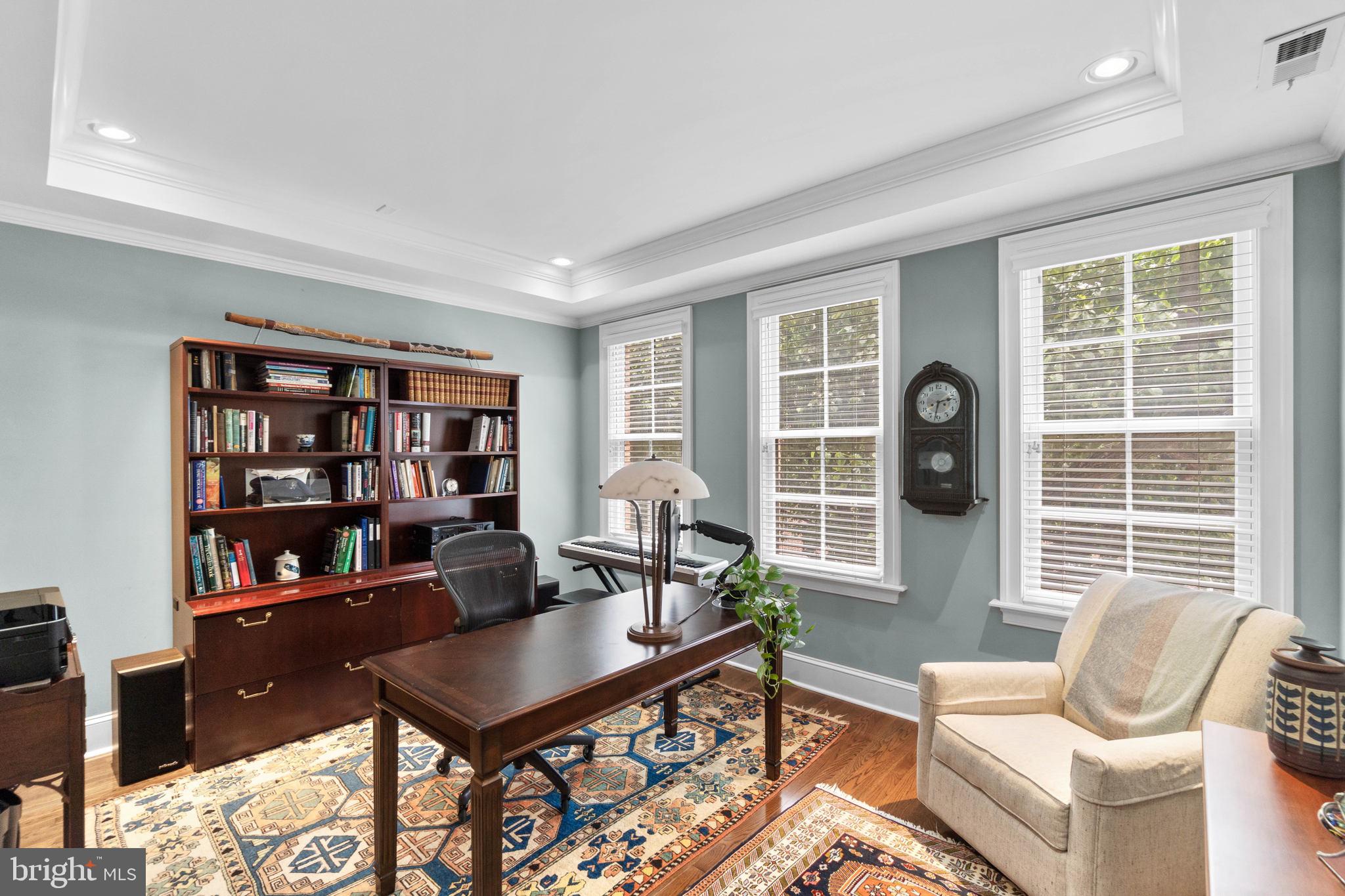 3418 Toone Street Baltimore, MD 21224 - Photo 15 of 51 Second level ensuite bedroom one w/ detailed trim.