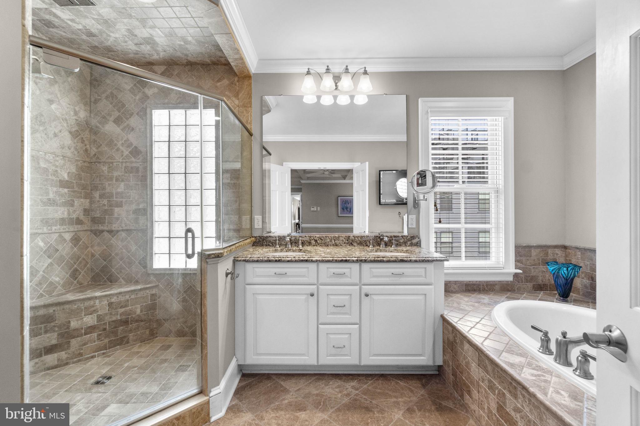 3418 Toone Street Baltimore, MD 21224 - Photo 27 of 51 Primary bathroom eight foot shower and vanity