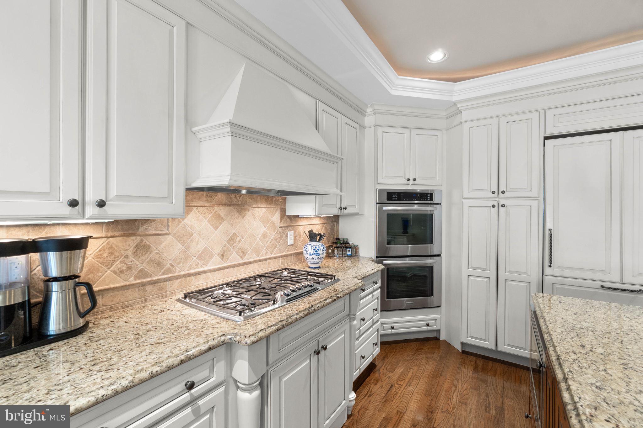 3418 Toone Street Baltimore, MD 21224 - Photo 7 of 51 Gas cooktop with custom hood