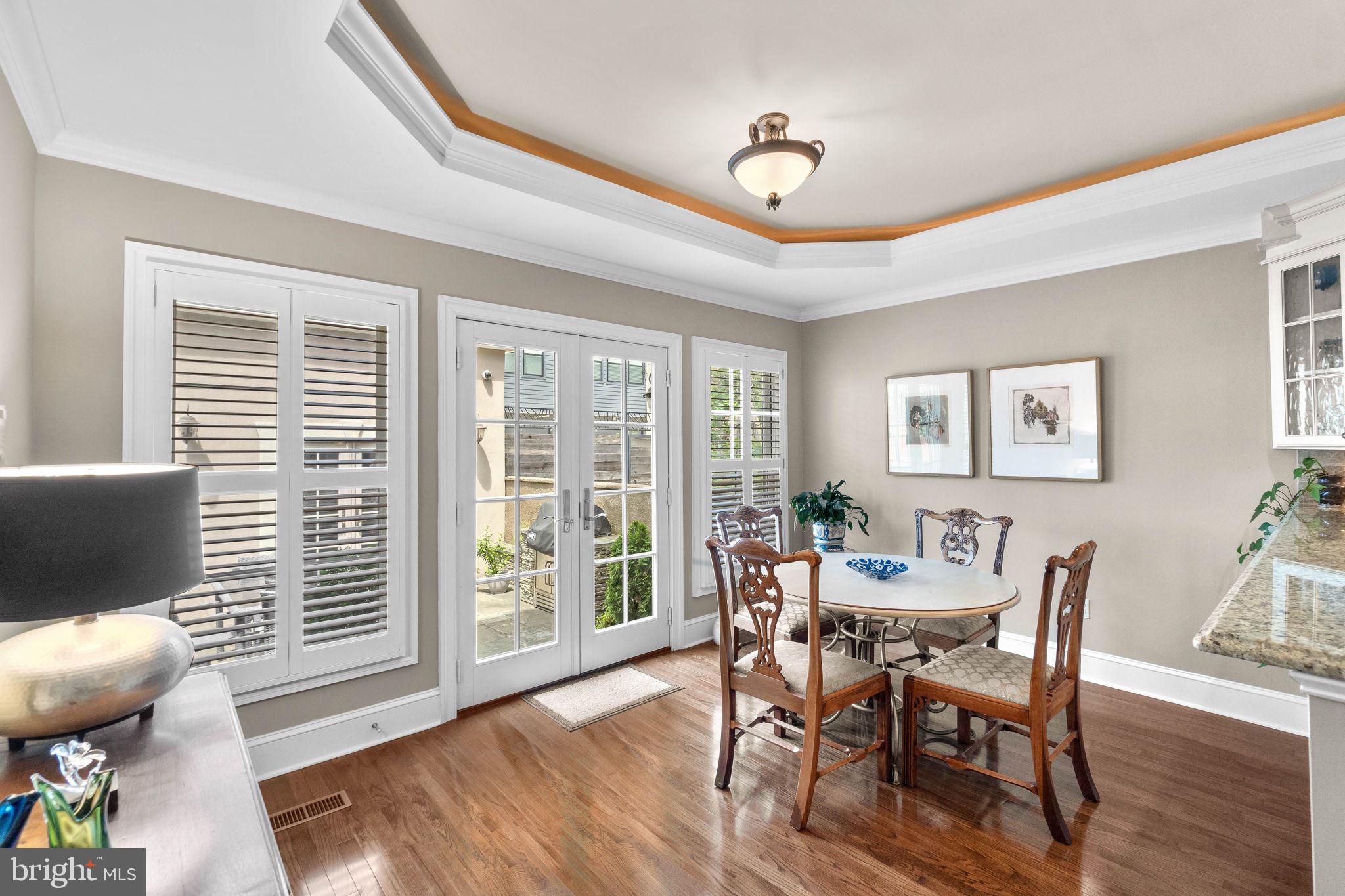 3418 Toone Street Baltimore, MD 21224 - Photo 10 of 51 Dining area leading to patio , ceiling details