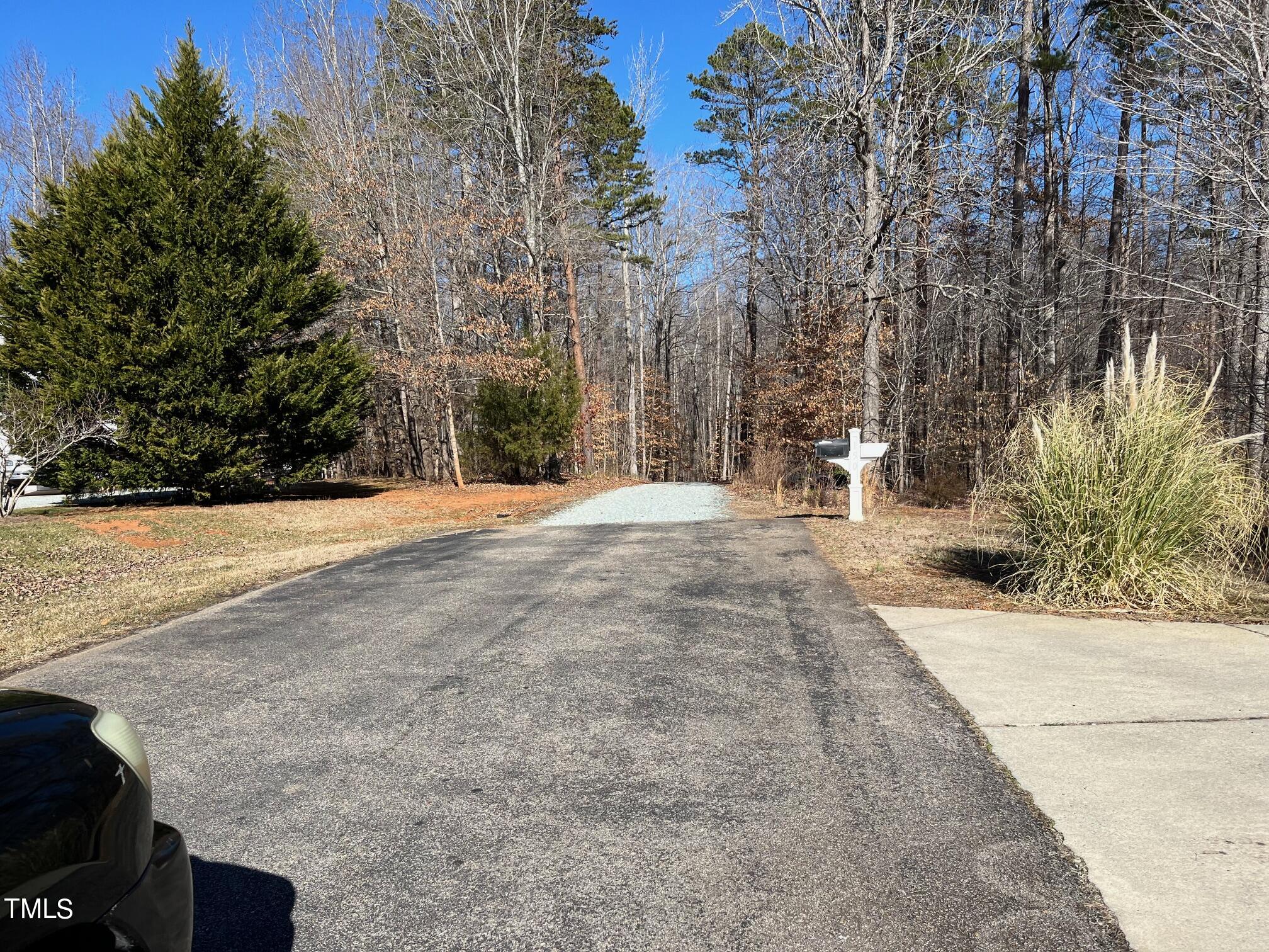 150 Cornerstone Lane Timberlake, NC 27583 - Photo 11 of 38 a view of outdoor space with trees