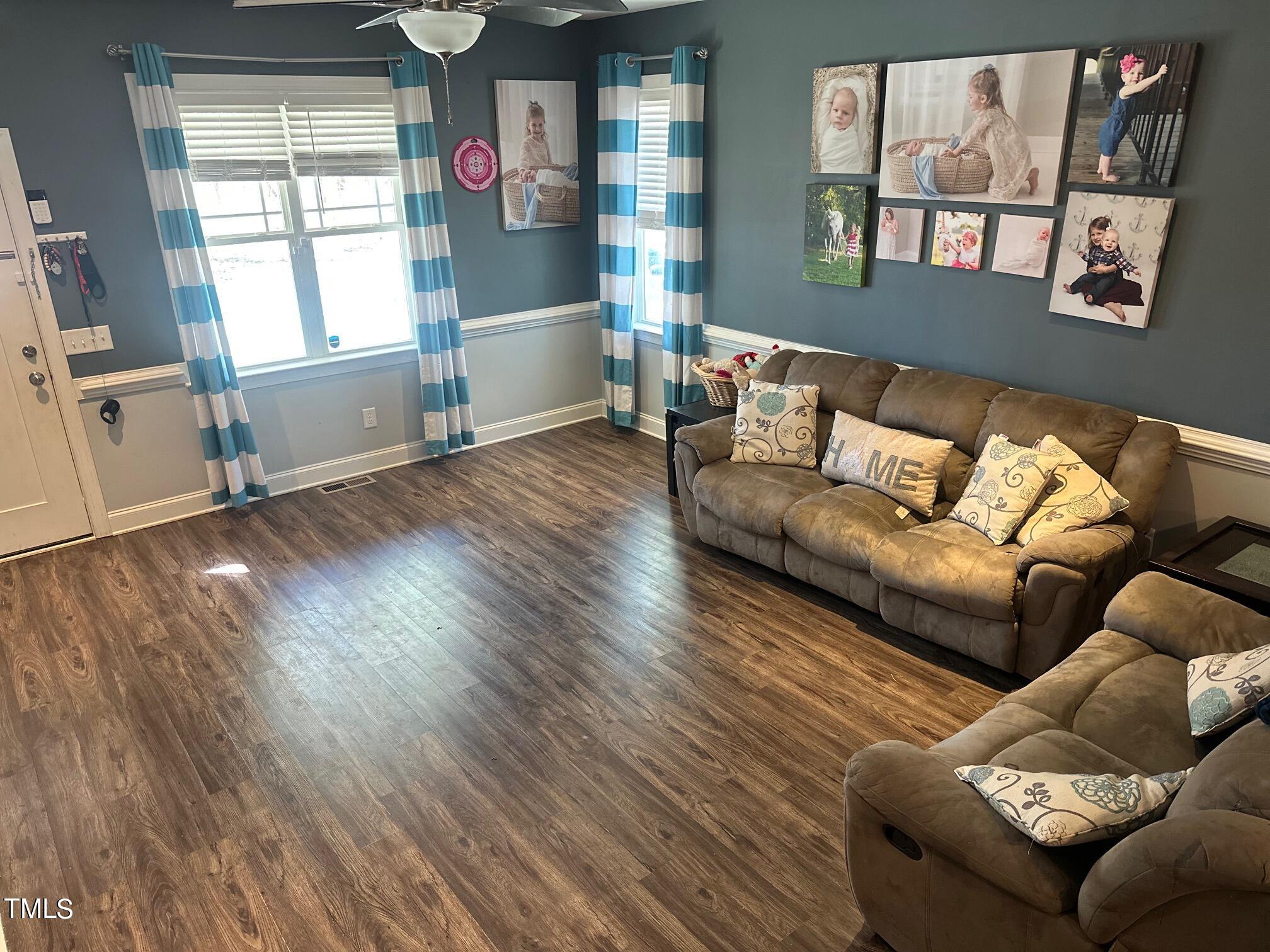 150 Cornerstone Lane Timberlake, NC 27583 - Photo 15 of 38 a living room with furniture and a window