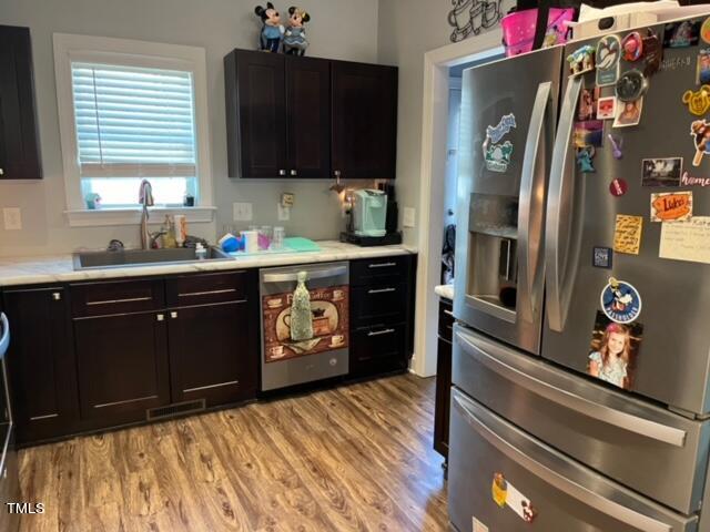 150 Cornerstone Lane Timberlake, NC 27583 - Photo 20 of 38 a kitchen with stainless steel appliances granite countertop a refrigerator and a stove