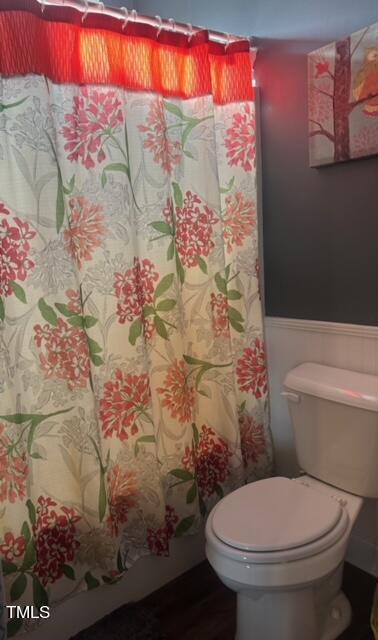 150 Cornerstone Lane Timberlake, NC 27583 - Photo 26 of 38 a white toilet sitting next to a shower curtain